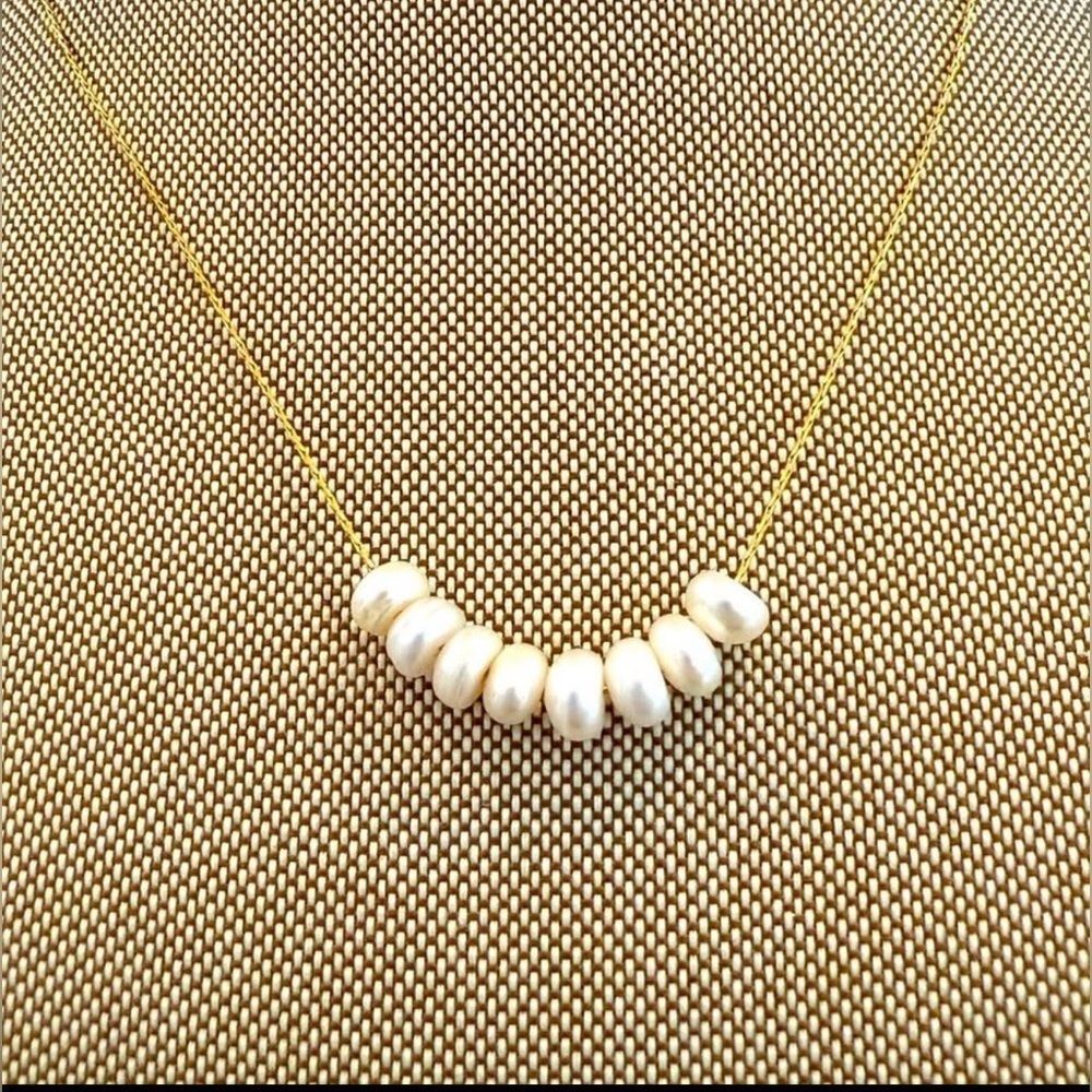 Elegant Gold and White Pearl Necklace